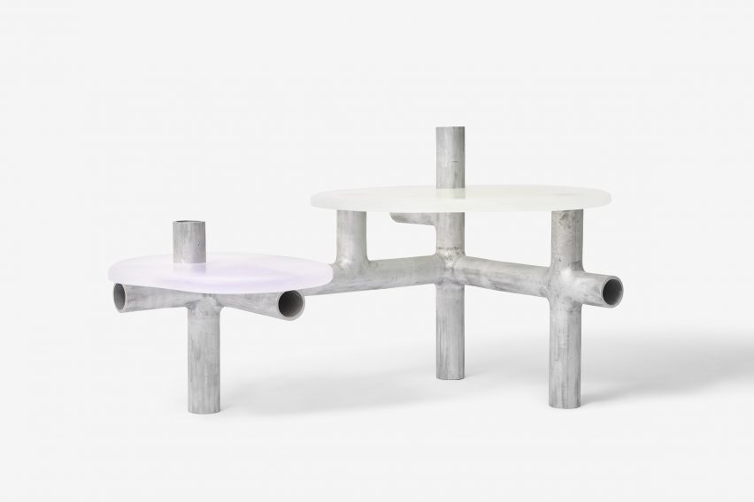 Metal and plastic item of furniture on white backdrop