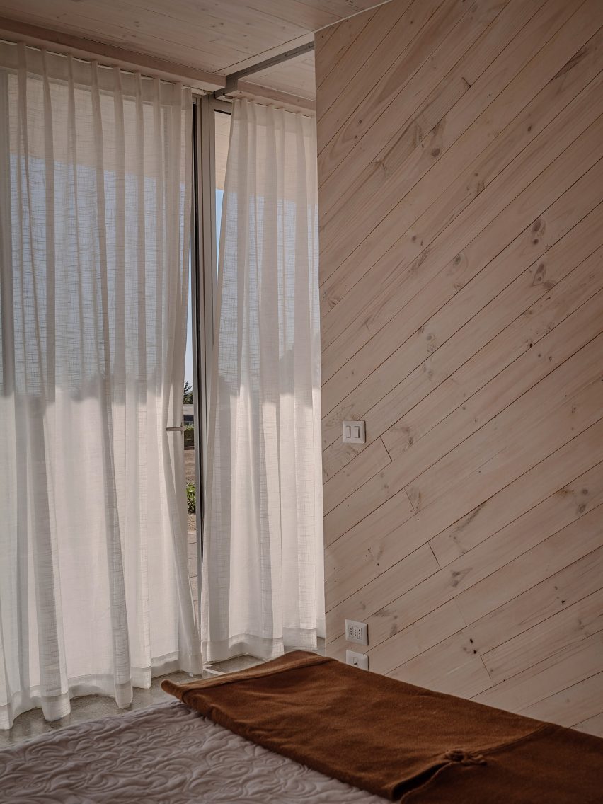 Hallway with light wood and curtain