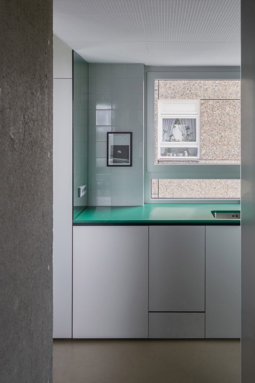 Kitchen with green worktop