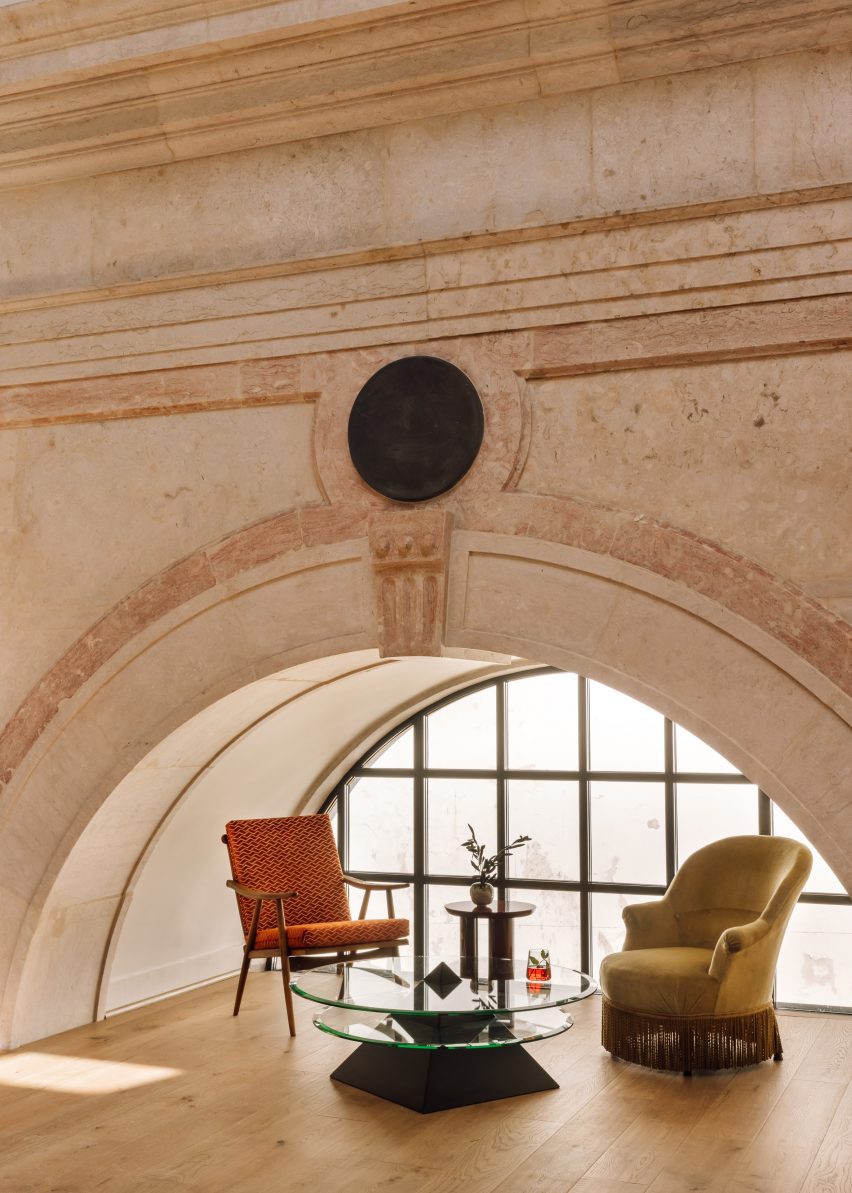 Chairs below archway Lisbon