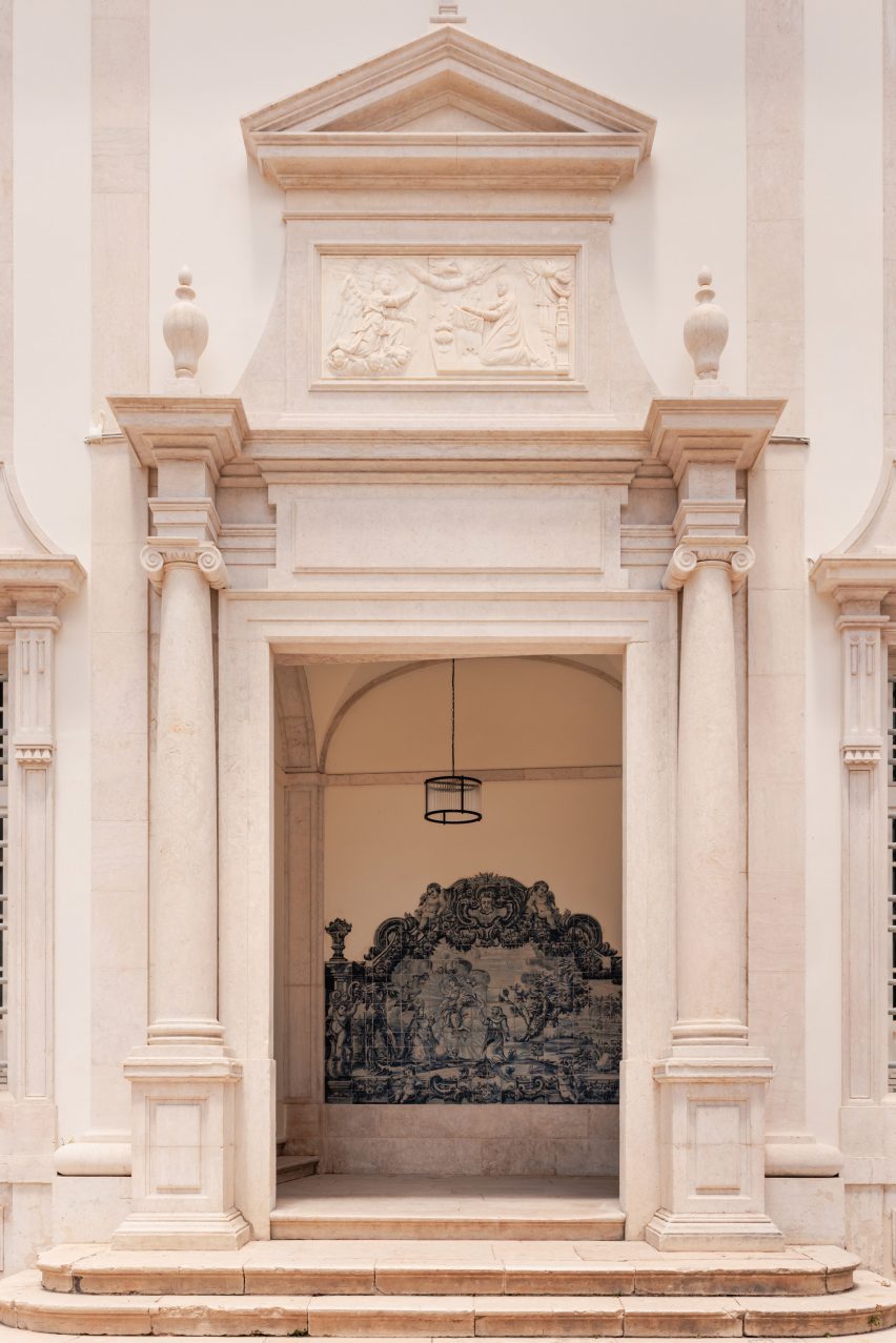 Mosaic tiles lining walls of old convent entrance