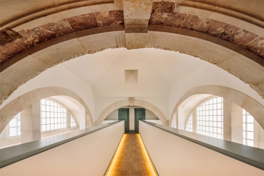 Arched mezzanine leading to rooms