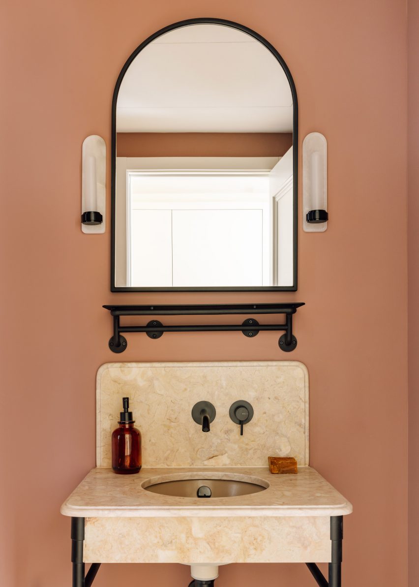 Washbasin made from Portuguese stone and arched mirror