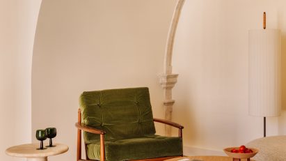 Green chair in convent hotel room