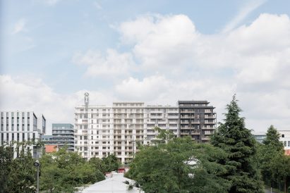Exterior view of Triptyque-designed Olympic Village housing in Paris