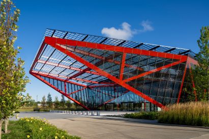 Massive red trusses on Pritzker Military Archives building