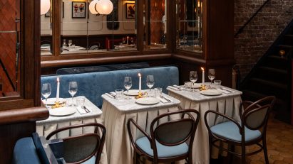 Individual tables in Henri restaurant in London by Dorothee Meilichzon
