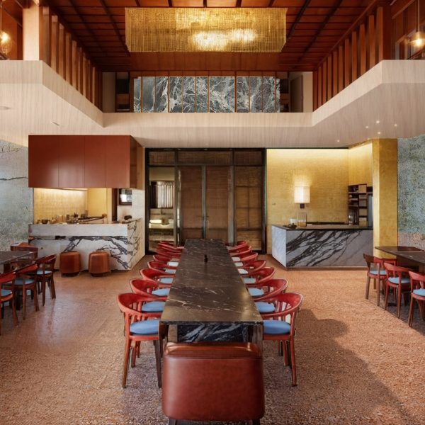 A visualisation of a restaurant in tones of red, orange and blue.