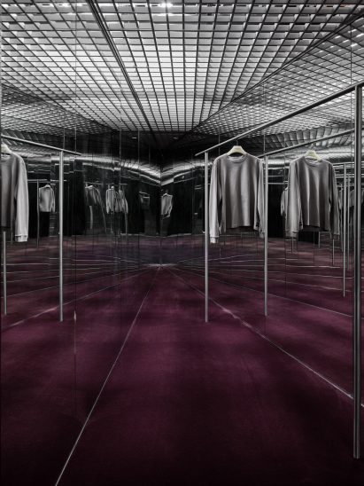 A triangular niche with mirrored walls that create infinite reflections