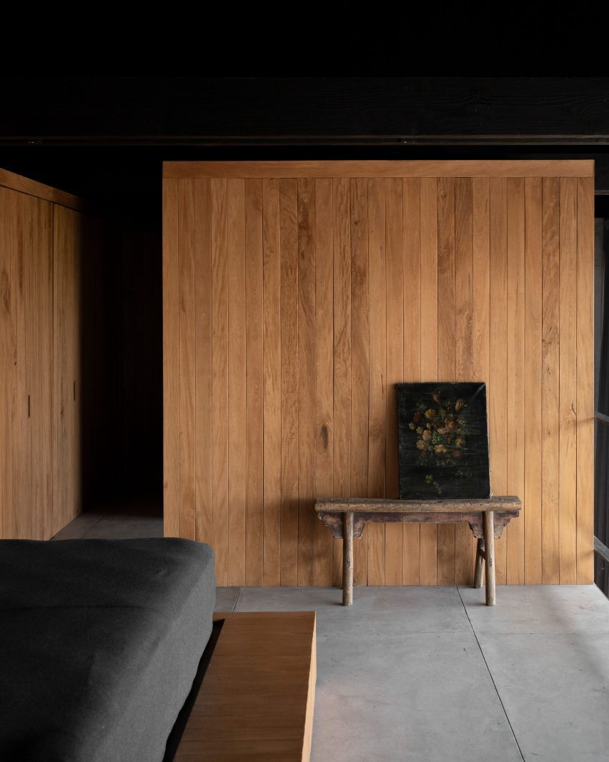Wooden panelled walls and Mexican modern chair