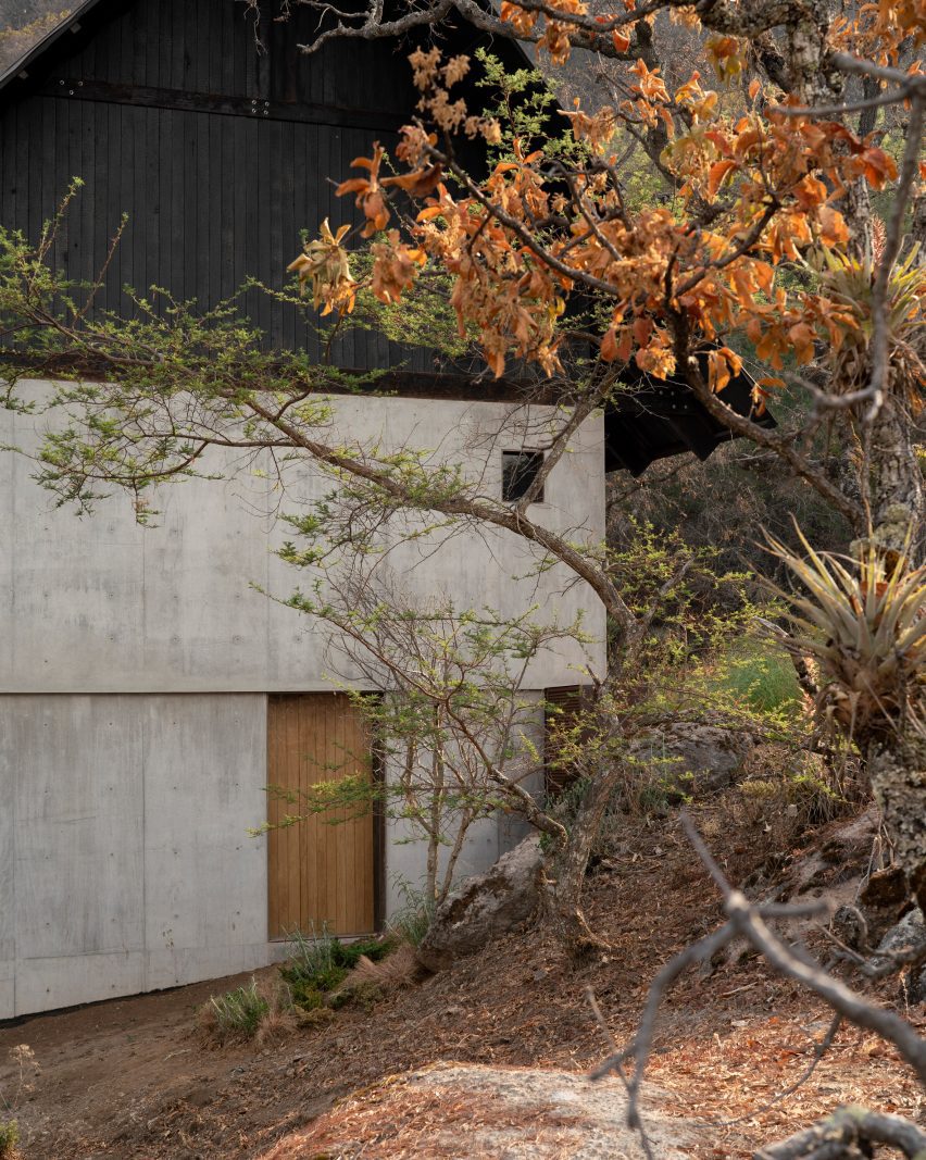 Concrete wall and black roof overhang
