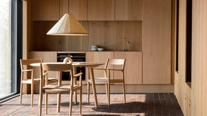 Brick-floor kitchen of Fjord Boat House