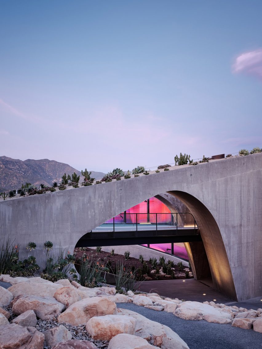Arched concrete house with pink light