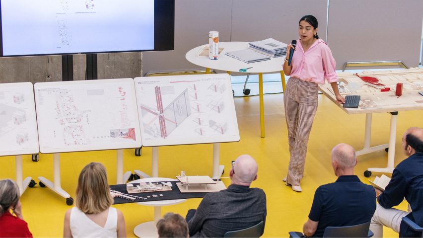 a person conducting a presentation at a university