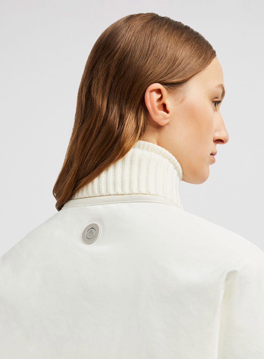 Button on Moncler jacket by Jony Ive