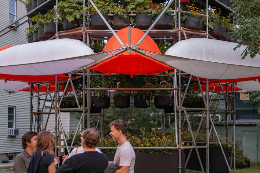 Installation with orange and white tents