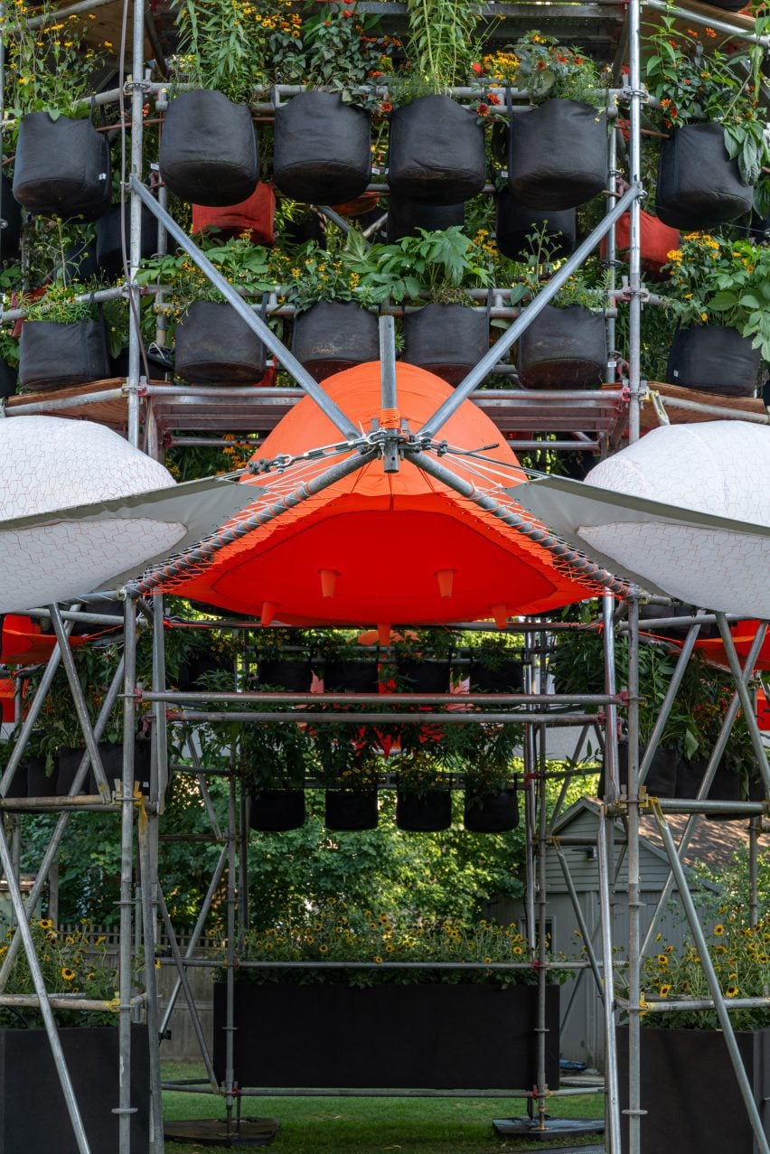 Installation with orange and white tents