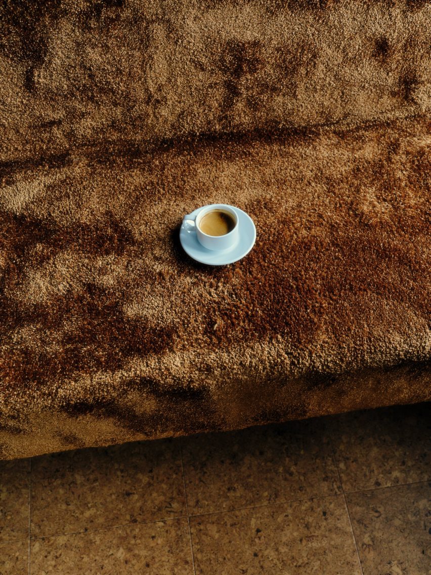 Brown carpet covered banquette seating