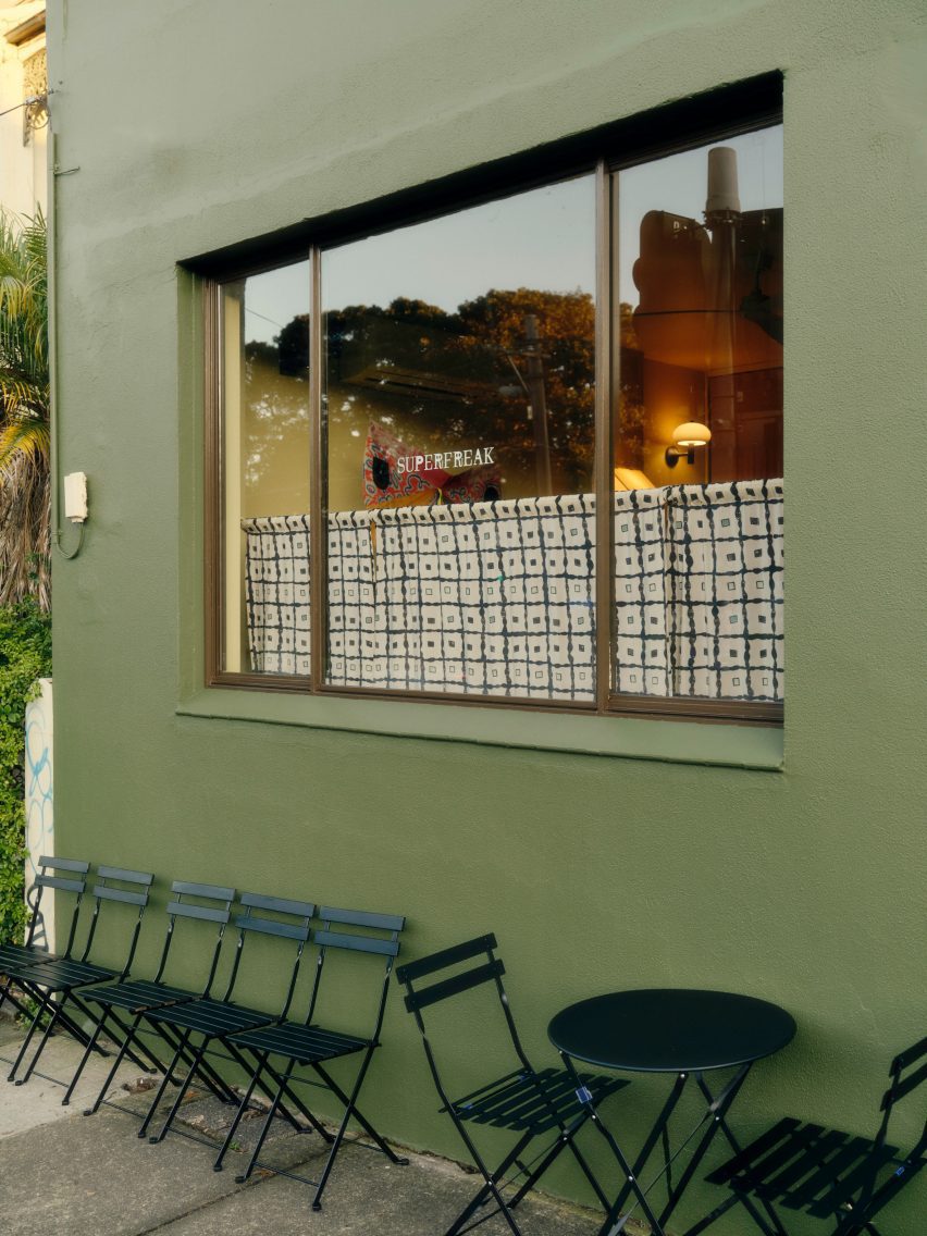 Green painted exterior wall of Superfreak cafe Sydney