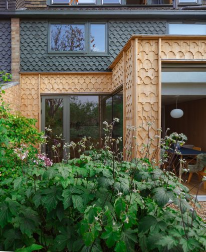 Shingle-clad exterior of London home extension by The DHaus Company