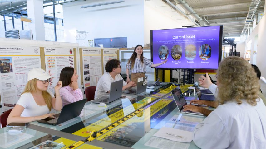 a photograph of students in a presentation
