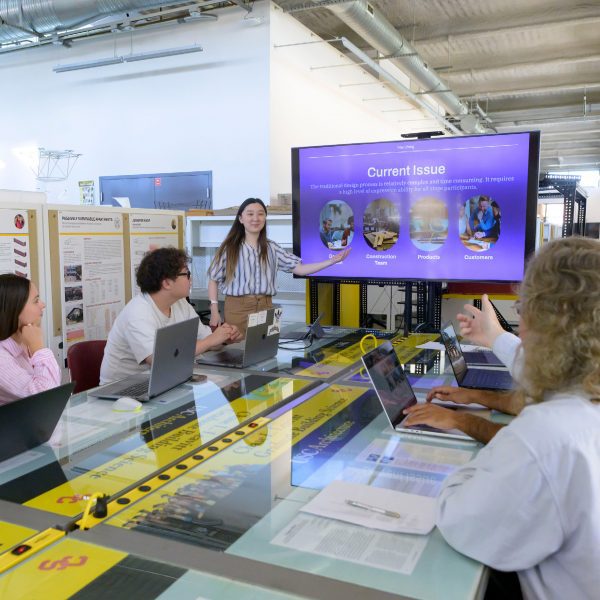 a photograph of students in a presentation