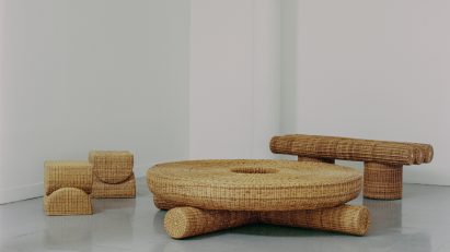 Photograph of two stools, a bench and a table woven from yaré.