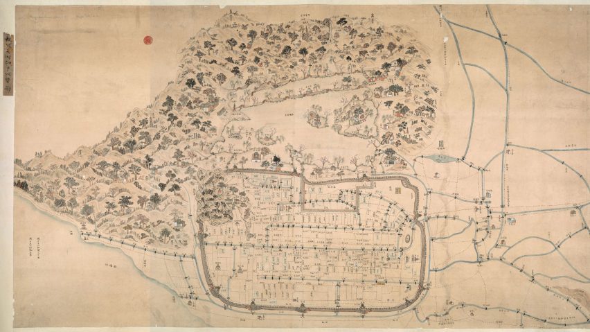 Photograph showing a map of a city.