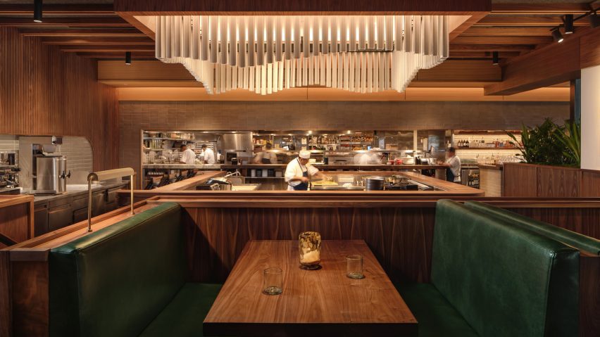 Michael Hsu fills Houston seafood restaurant with dark wood and green accents