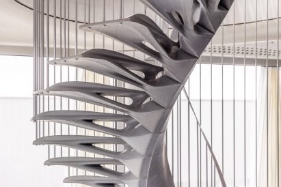 Medium close-up photo of the Cadenza concrete staircase showing thin and contoured steps