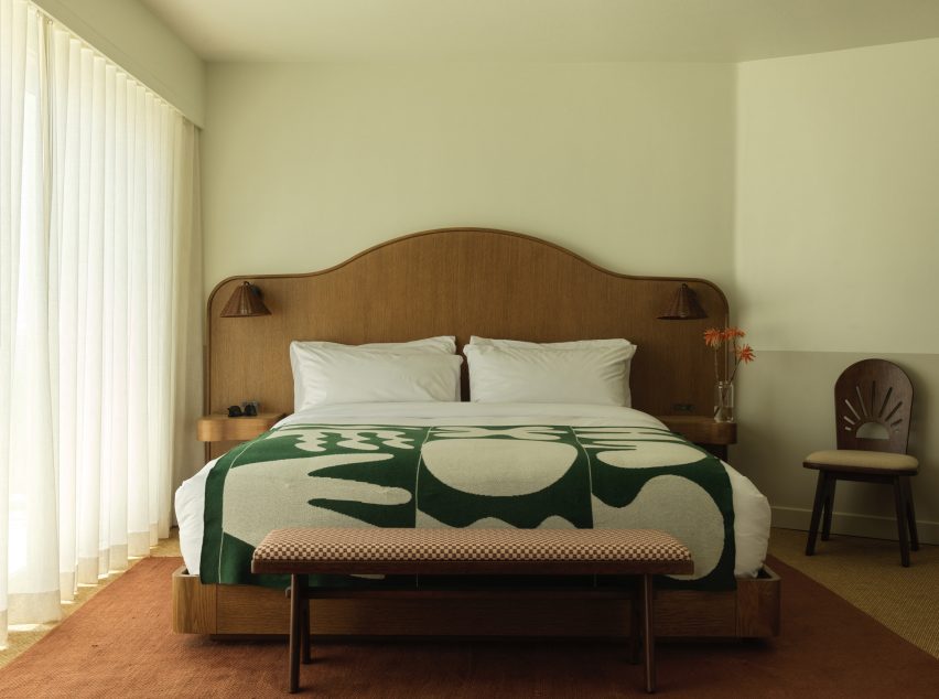 Bedroom with green blanket
