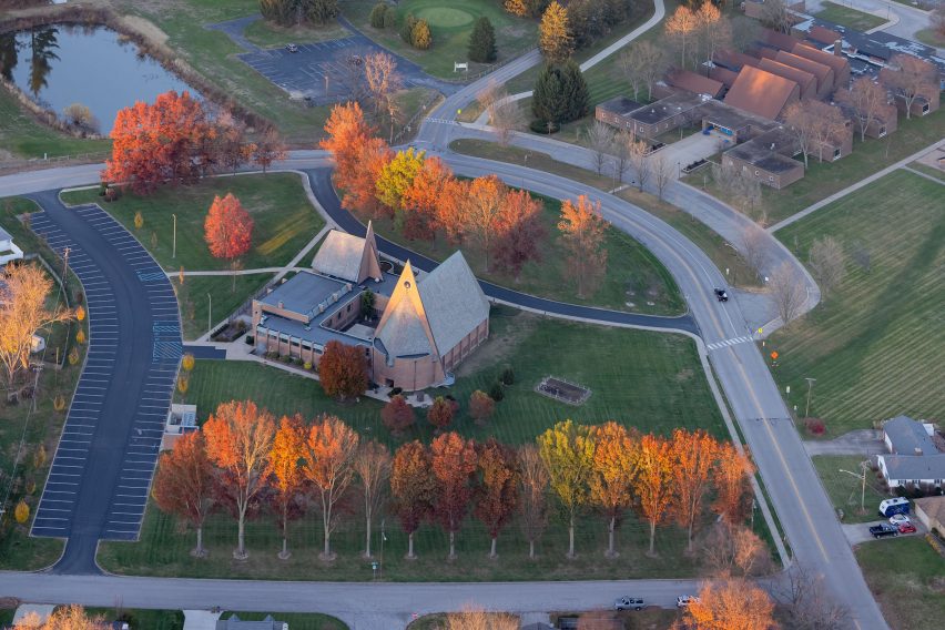Modernist church with multi-coloured leaves