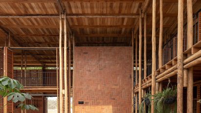 A building with brick wall and wooden structure