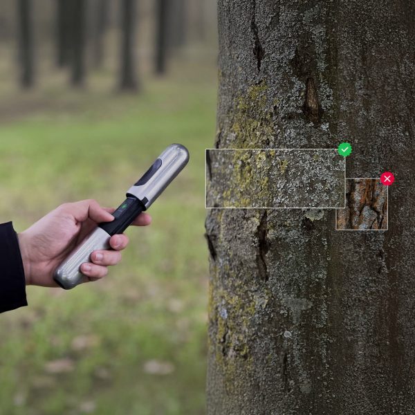 Hanju Seo's EarthCode handheld device scanning tree bark