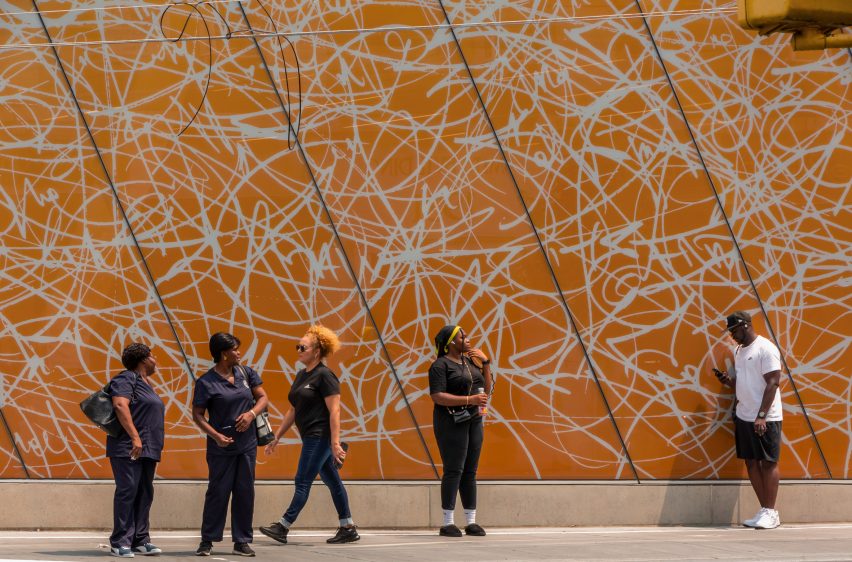 People standing in front of facade