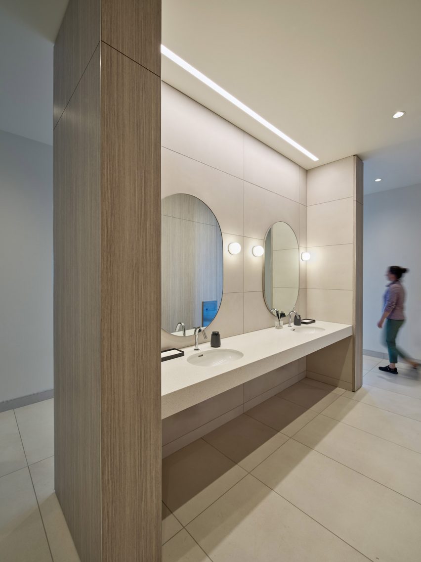 Person walking in a bathroom