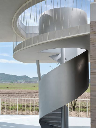Spiral staircase within stopping station by Mur Mur Lab