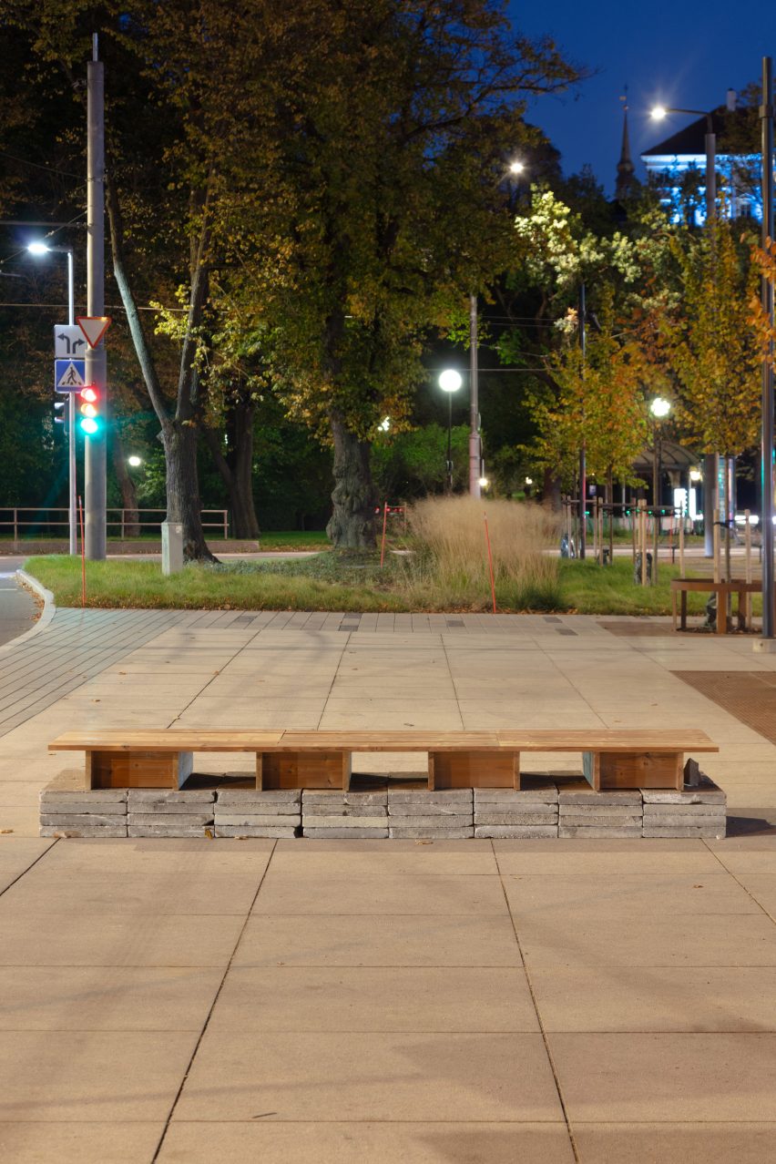 Wooden bench adjacent to No Time to Waste pavilion