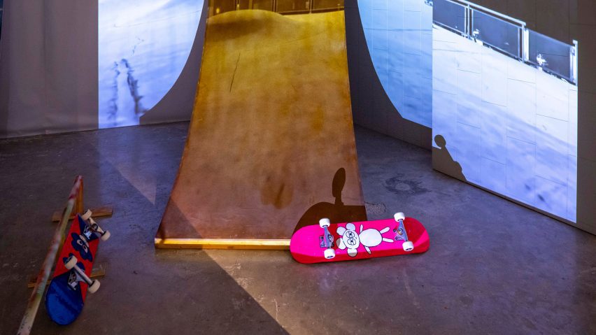 a photograph of a skateboard next to a ramp