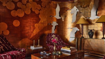 De Gournay golden interior with plush chairs