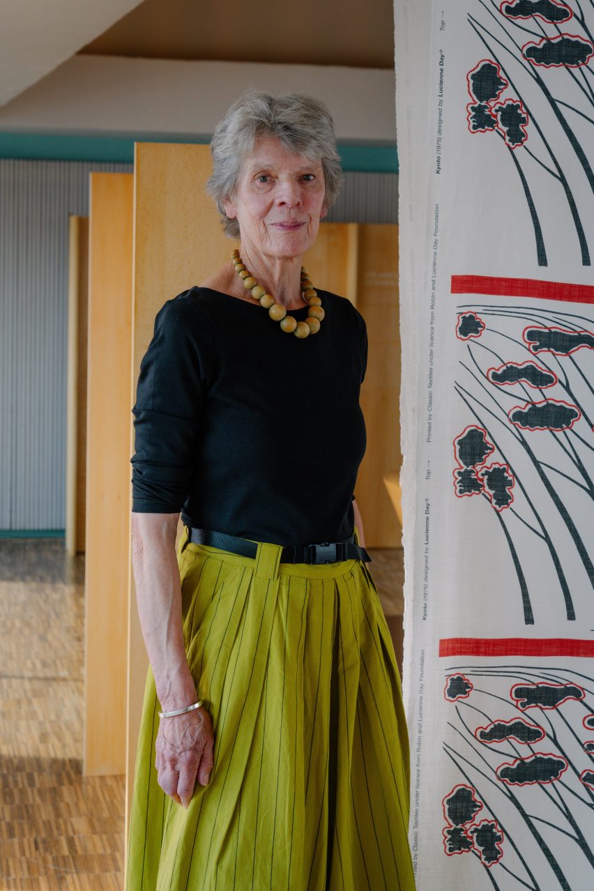 Paula Day in front of patterned fabric