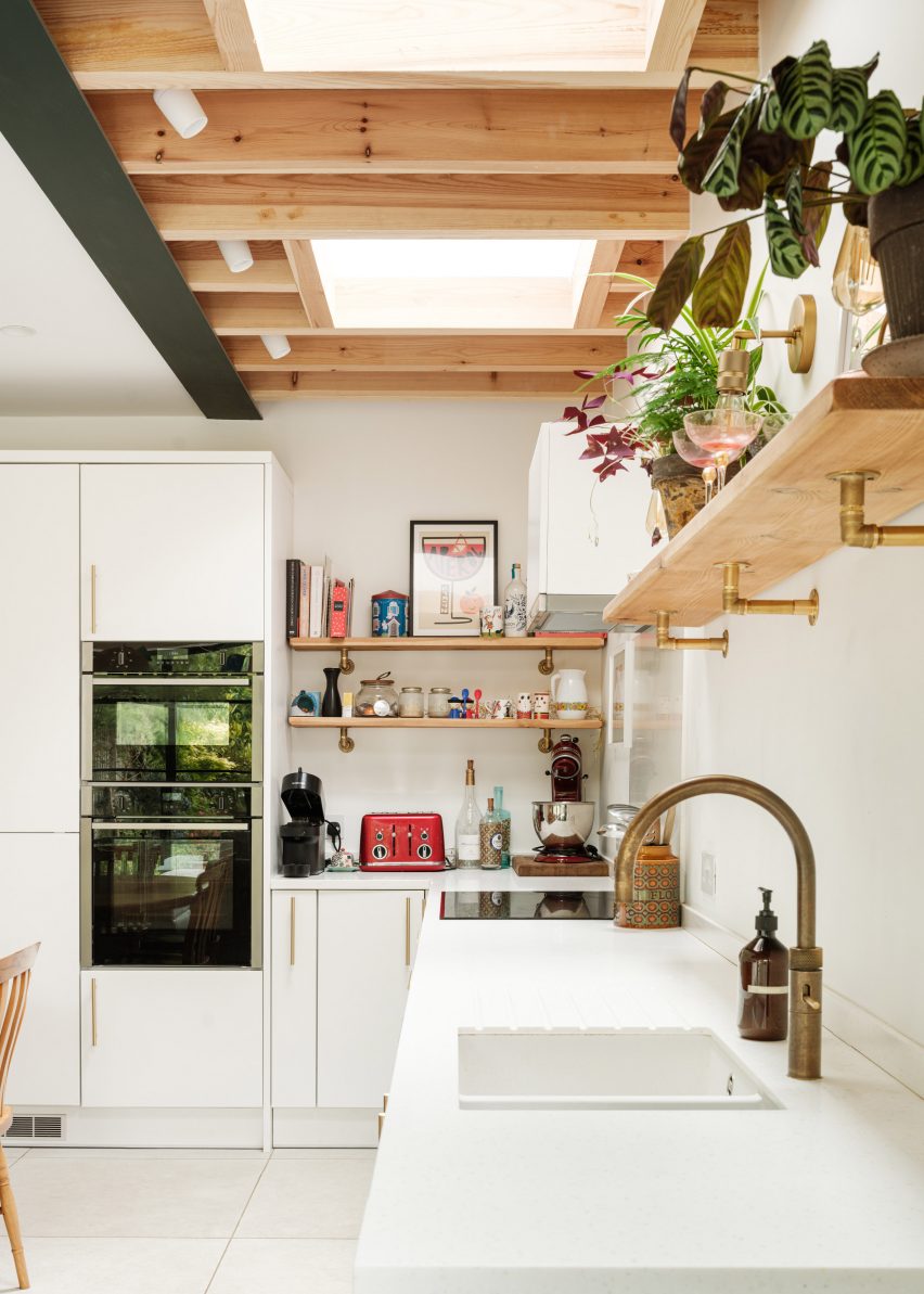 White walls and kitchen fittings in light filled residential extension