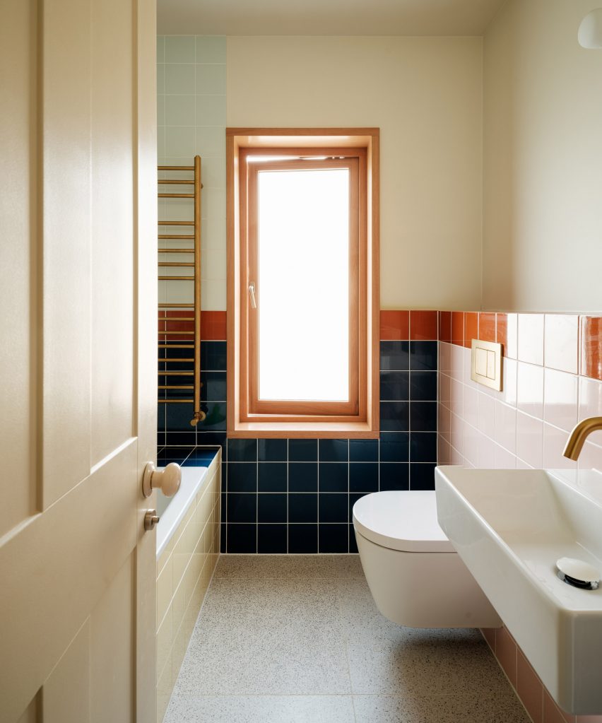 Colourful bathroom tiles in blue and orange