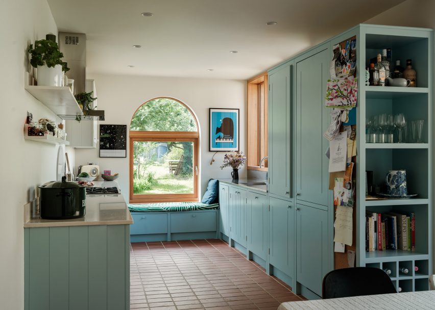 Blue painted kitchen and arched window Number 5 Station Road