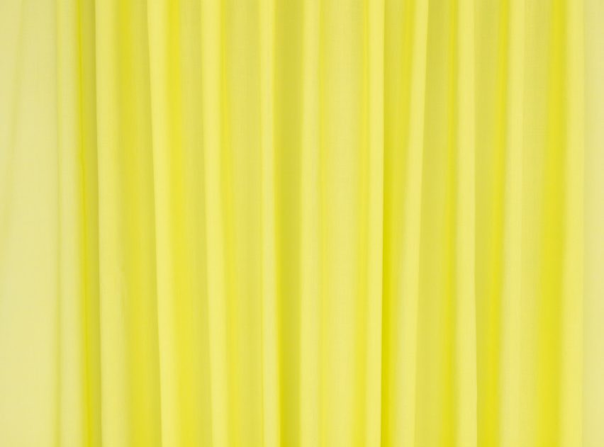 Close-up photo of the Kirkby Design Aloe fabric in a bright acid yellow