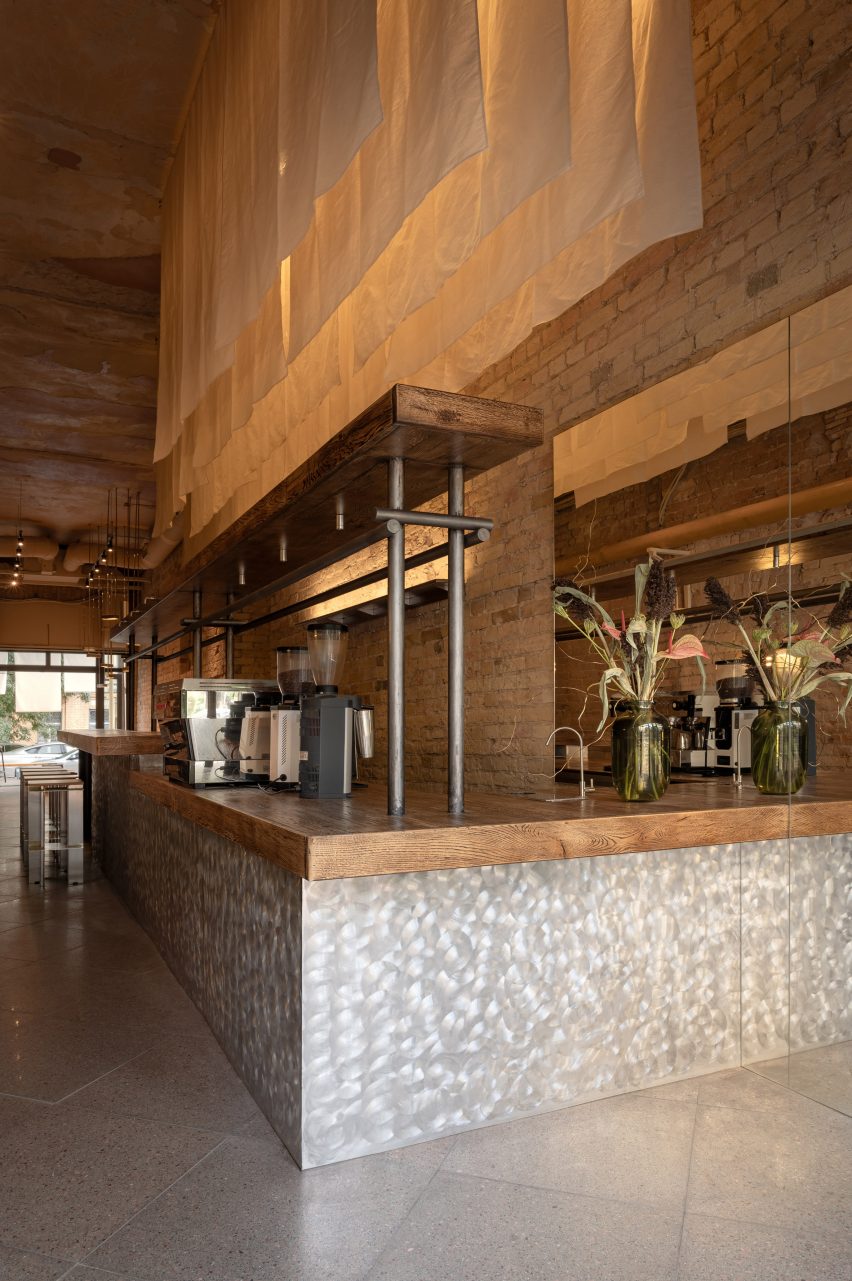 Restaurant interior with wooden and metal furniture