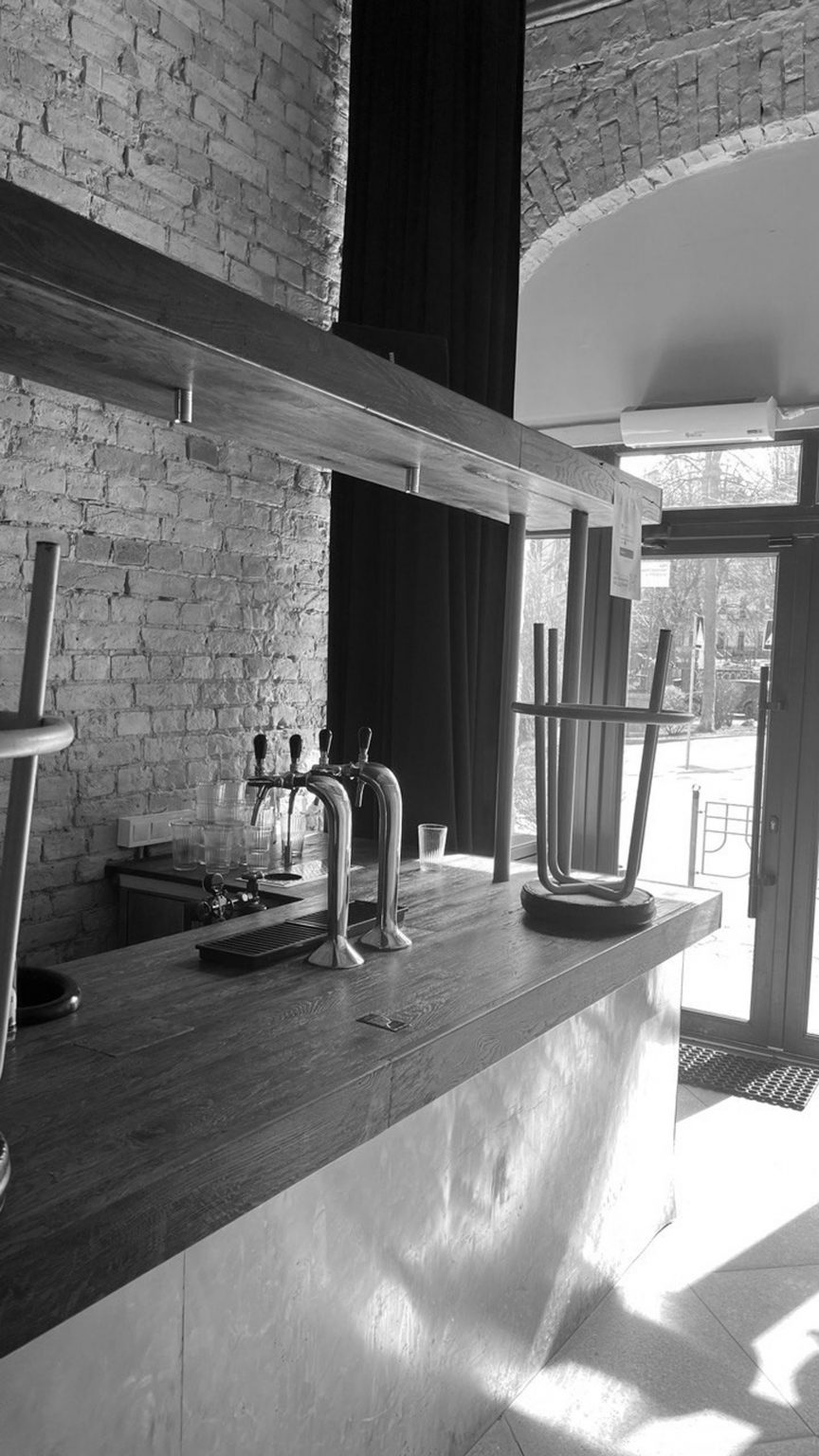 Black and white photo of the interior before remodelling