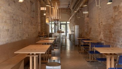 Restaurant interior with wooden and metal furniture