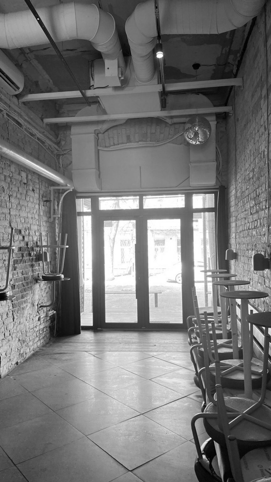 Black and white photo of the interior before remodelling