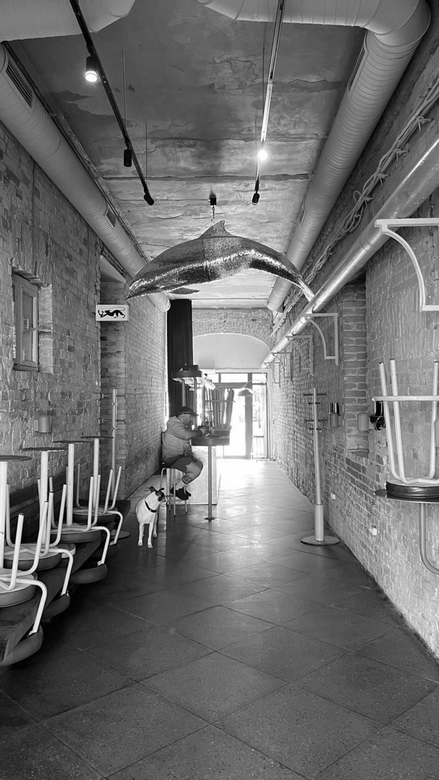 Black and white photo of the interior before remodelling